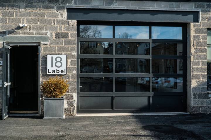 18 Label Studios exterior with glass garage door