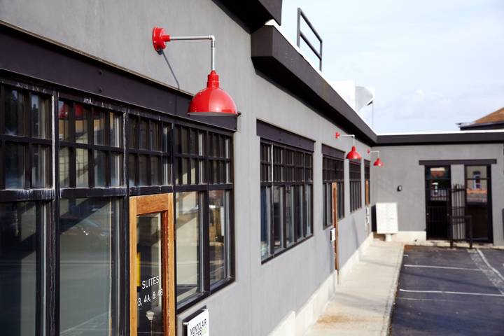 7 North Willow Street with black steel windows and red barn lights